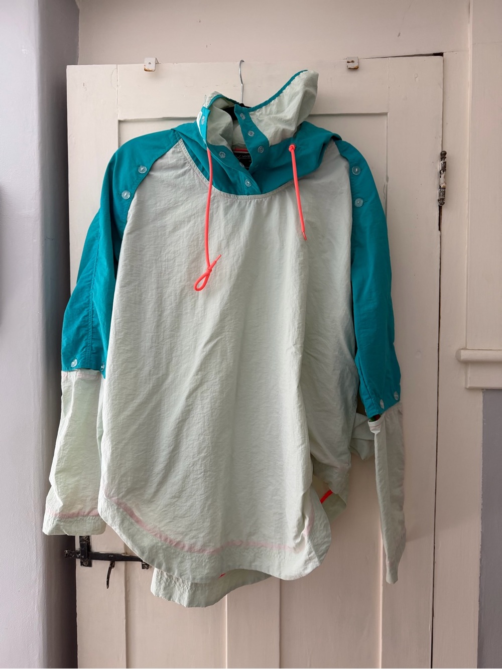 Without Walls Teal Rain Jacket with Light Mint Lining and Coral Trim
